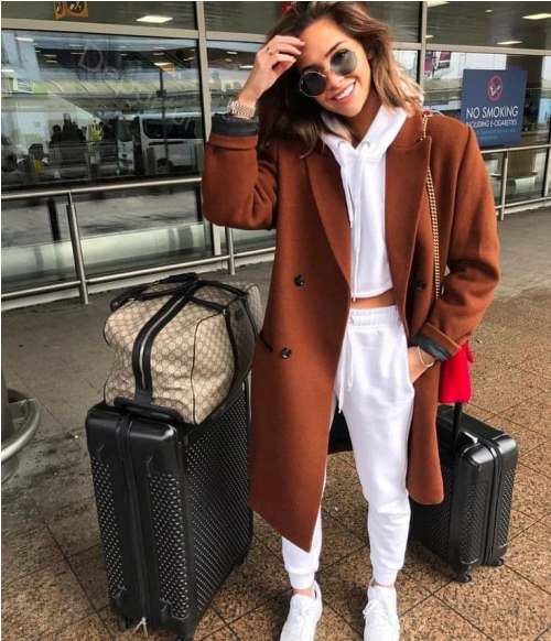 Traveling style in winter cozy coats Just Trendy Girls