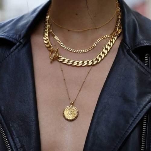 Layering golden necklaces and bracelets | | Just Trendy Girls